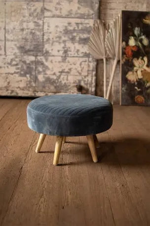 Pouf in velluto con gambe in legno
