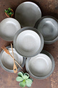 Set da 12 piatti e ciotole in ceramica color avena